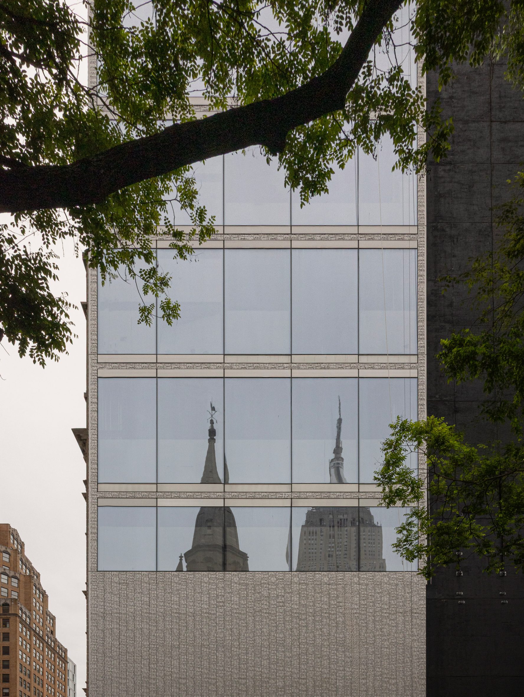 Meganom's tower clad in rows of custom aluminium bricks