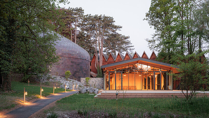 Pre-patinated copper shingles at La Source Vive, aged before installation