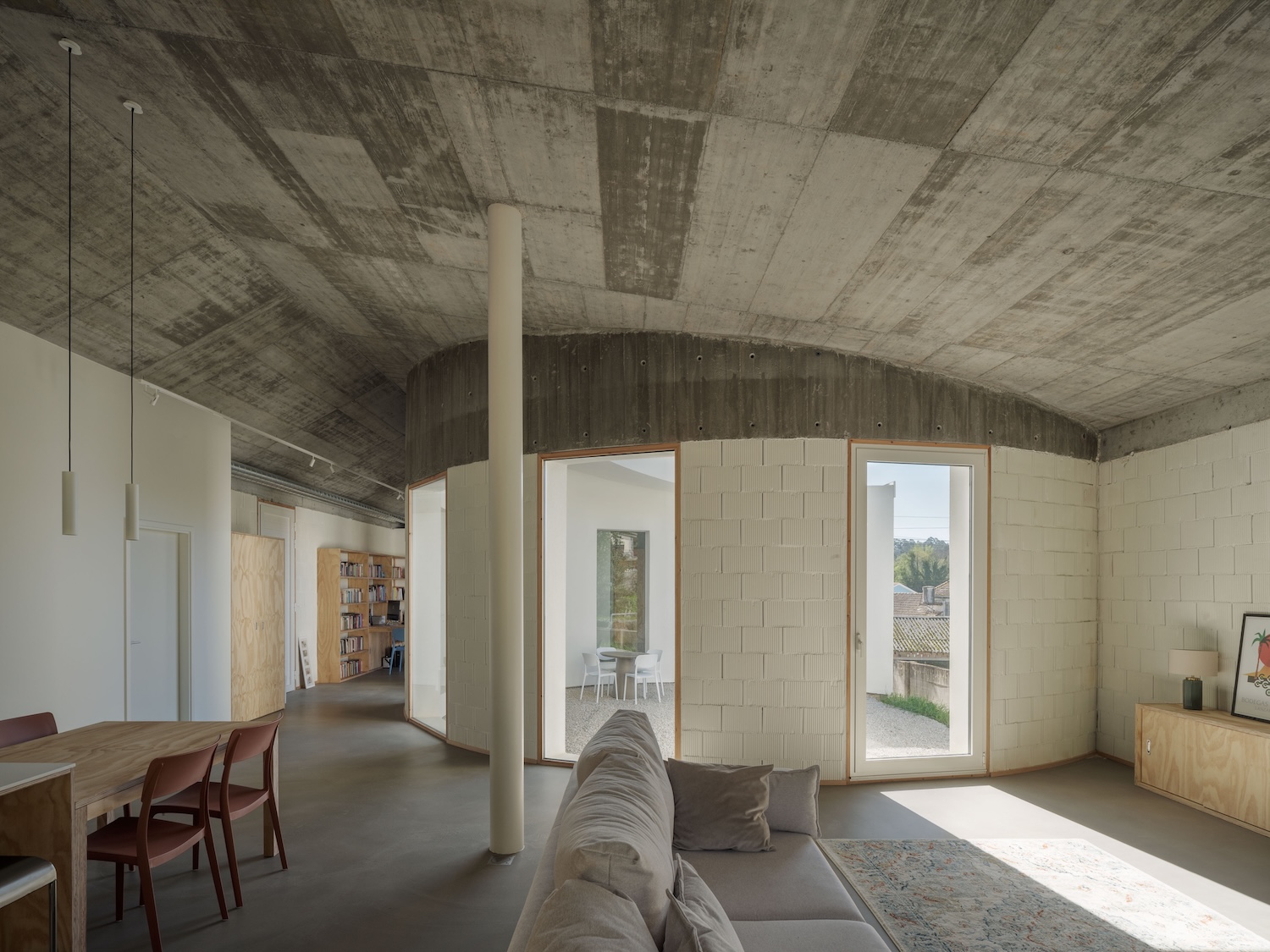 White rendered volume of Cecebre House set into its terraced Galician site