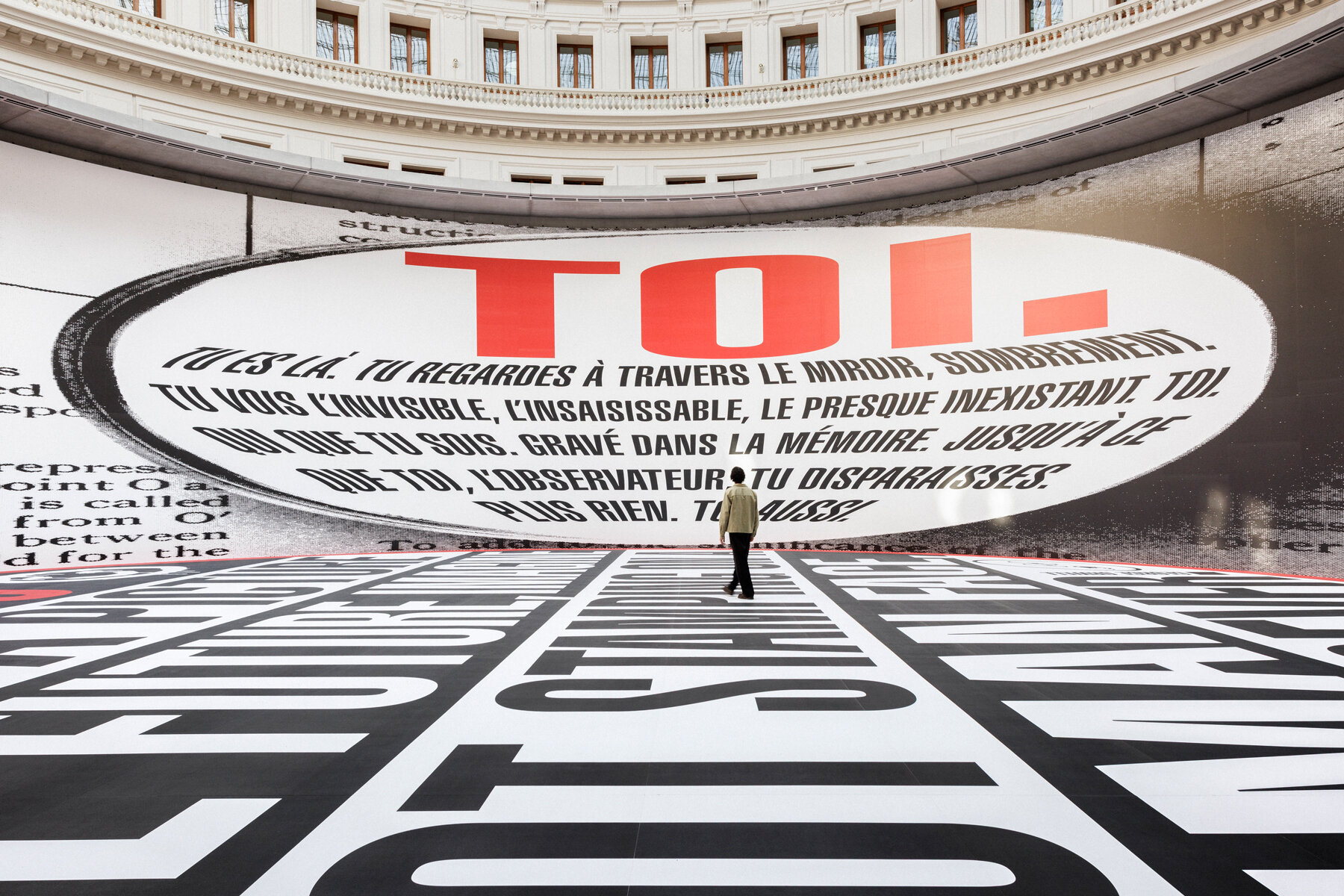 Barbara Kruger's The History of Tears filling the concrete rotunda at the Bourse de Commerce in Paris
