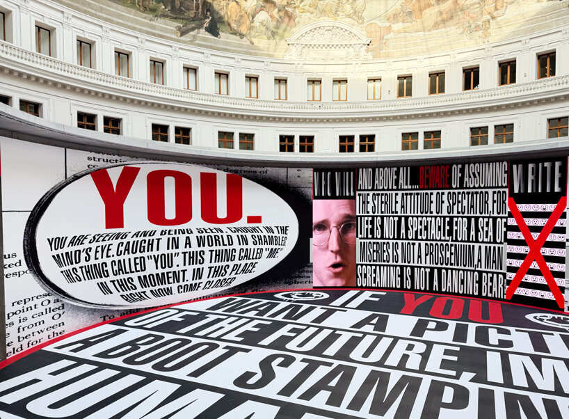 Orwell's 1984 quotation laid across the floor of the rotunda at a scale readable only from above
