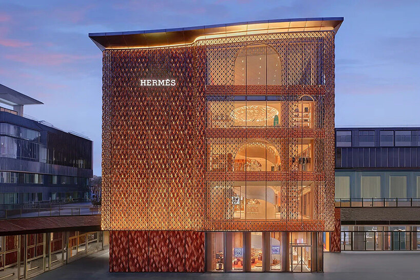 The rose-pink ceramic veil of the Hermès flagship in Beijing, by Mamou-Mani and RDAI