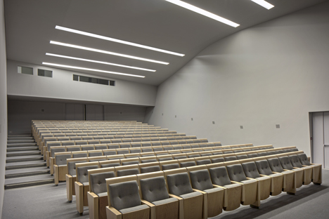 Inside the 220-seat auditorium. Photography via Dezeen