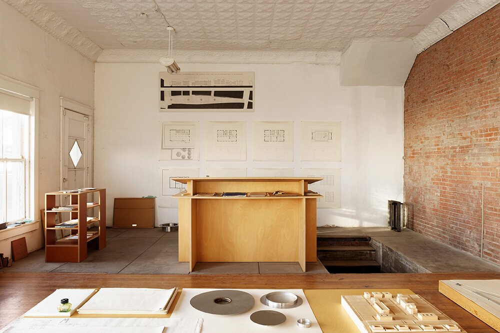 Interior of the Architecture Office, with Judd's plans, models and furniture installed