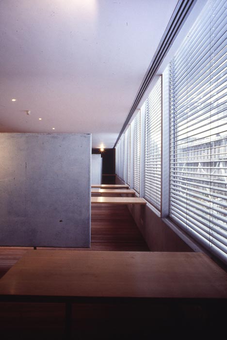 Inside the House in Bom Jesus: concrete, a slot of light, blinds, nothing else. Photography by Luis Ferreira Alves, via Dezeen