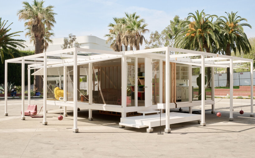 Panels raised, the house open to the air