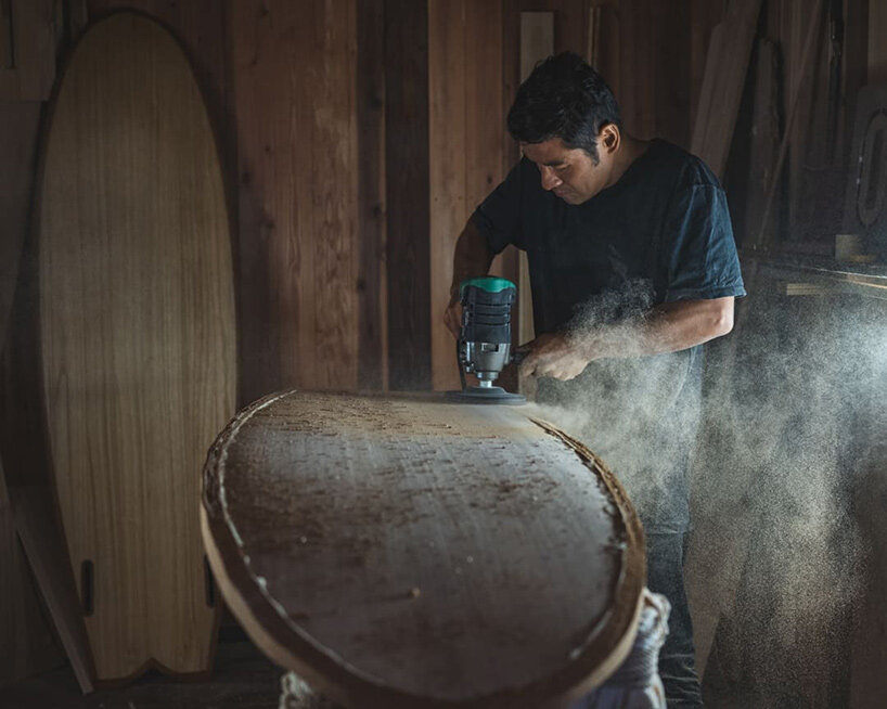 Cedar and urushi, the grain left visible under the gloss