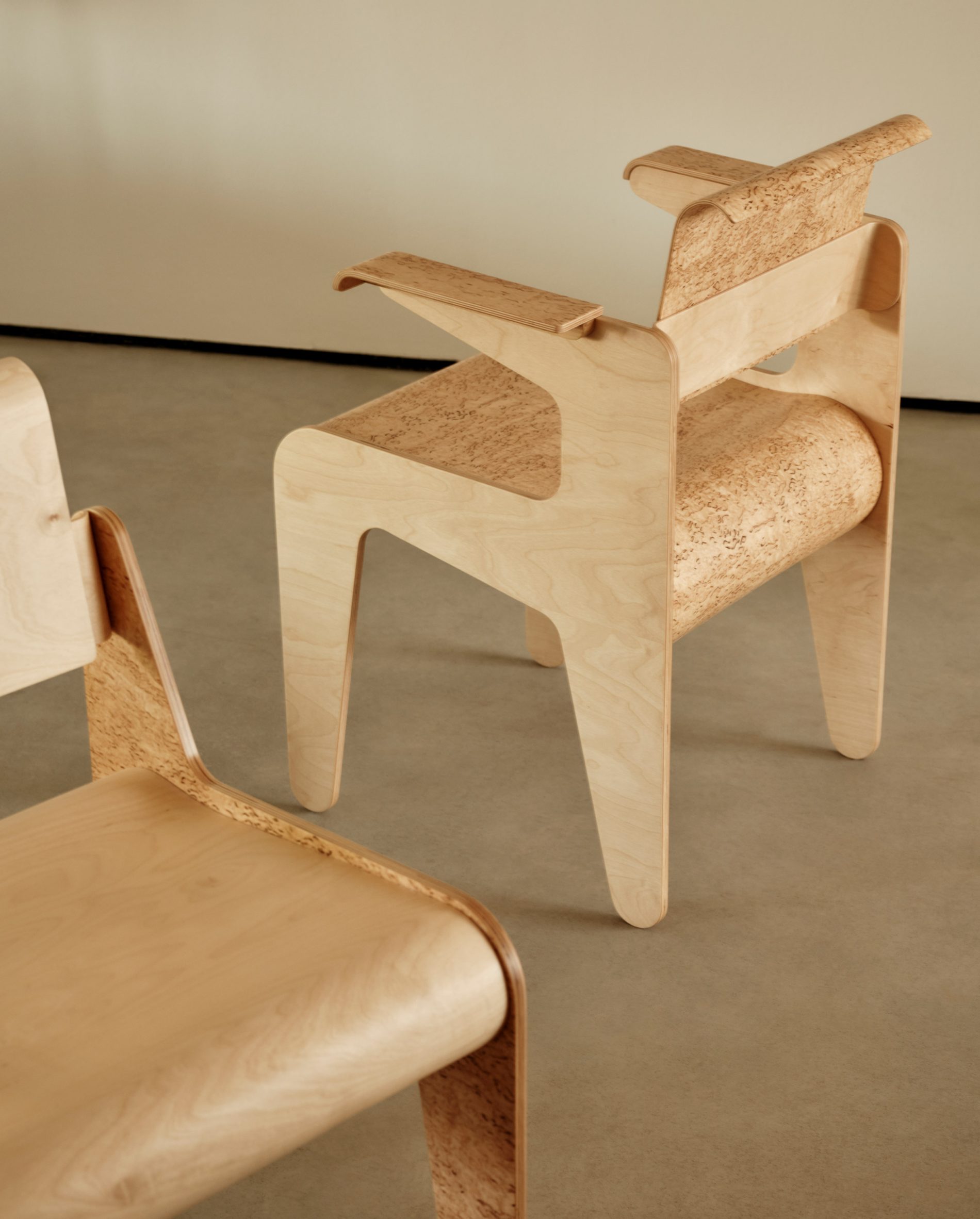 Masur birch chairs and tables from the Masur Edition arranged in the Béton Brut showroom