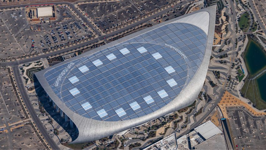 Allegiant Stadium in Las Vegas, a sealed black monument beside the freeway