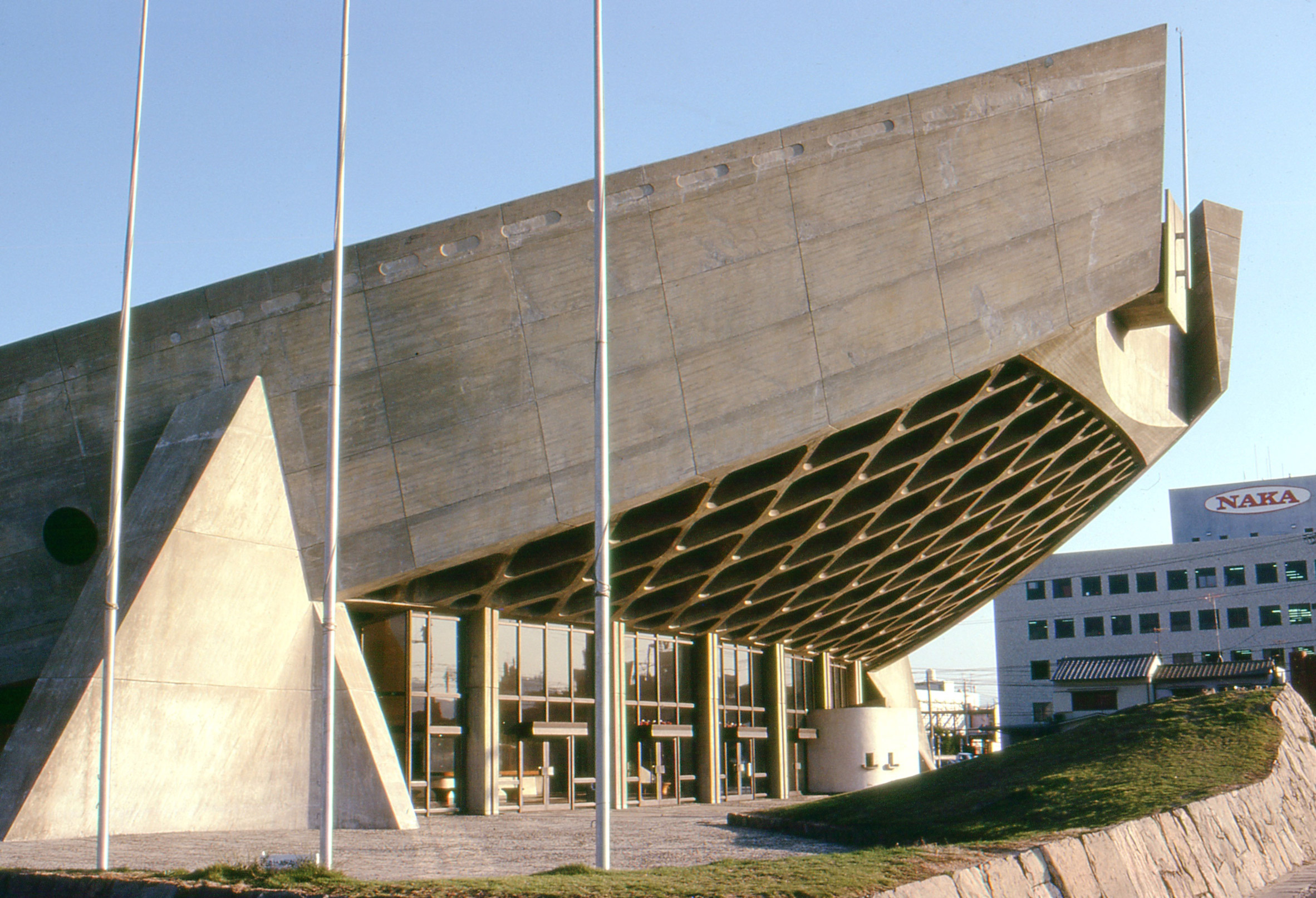 The ribbed concrete and the upward-curving roof that gave the building its nickname