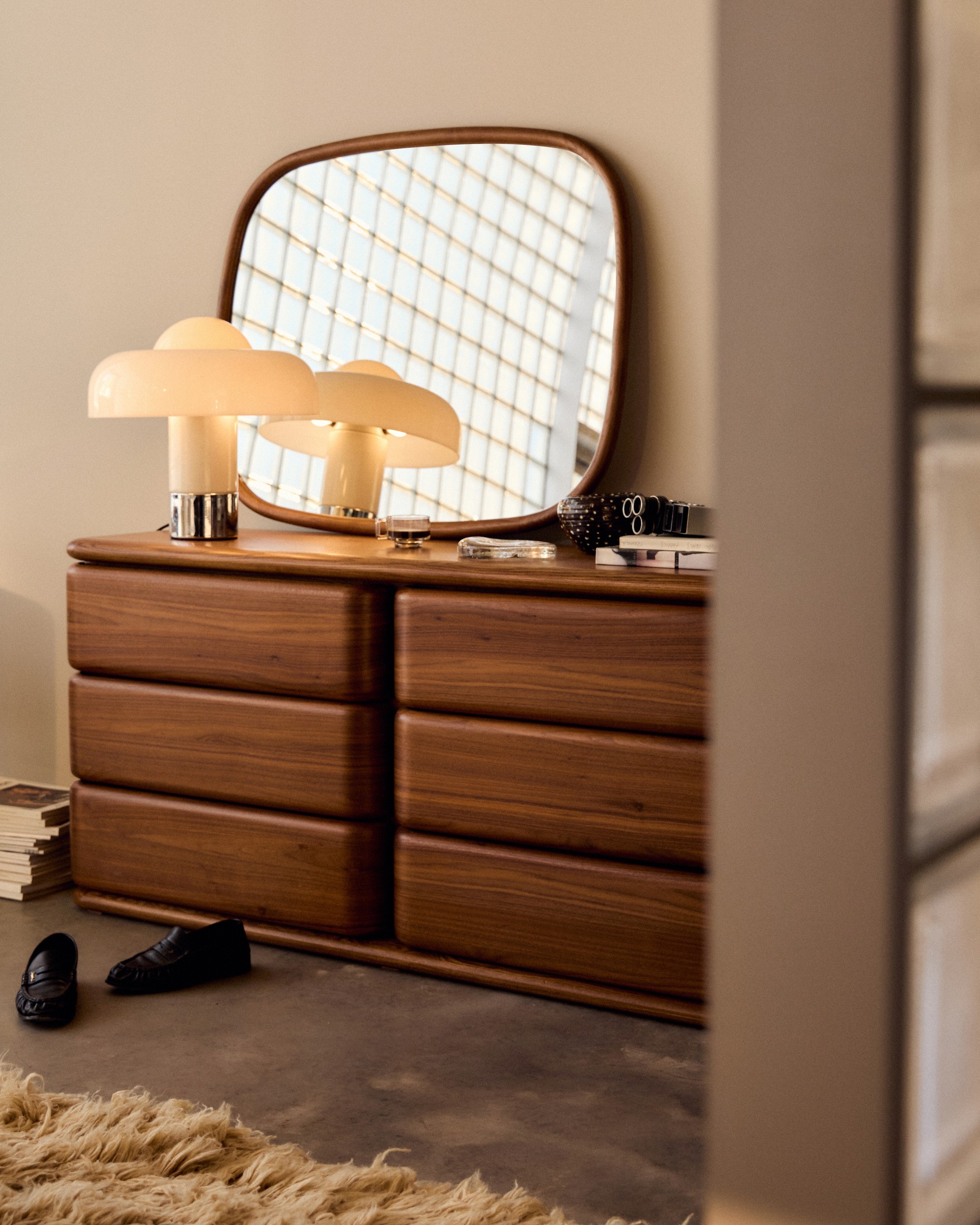 The Notte storage piece, walnut stain with a shadow line front to back