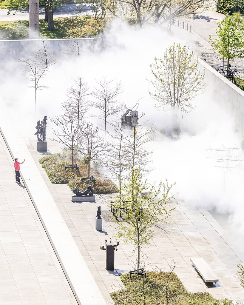 Water mist moving through the trees of the sculpture garden